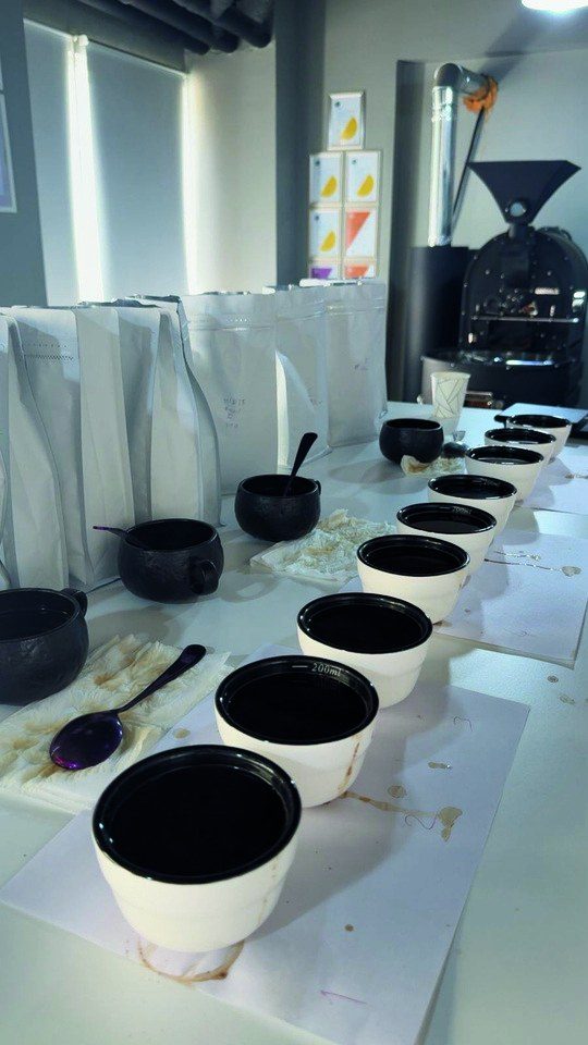 The cupping table, where this lineup was chosen
